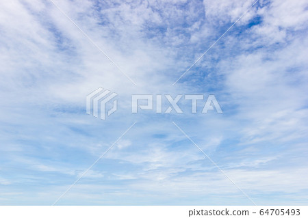 Transparent blue sky with clouds and atmospheric afternoon. 64705493