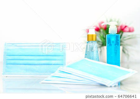 Medical masks and Alcohol gel bottle sanitizer 64706641