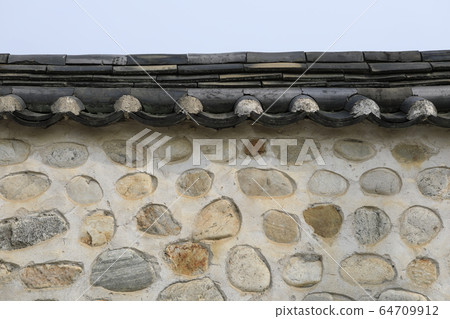 Landscape with stone walls and roof tiles Landscape with stone walls and roof tiles 64709912