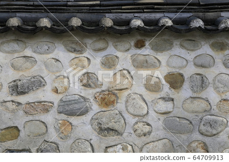 Landscape with stone walls and roof tiles Landscape with stone walls and roof tiles 64709913