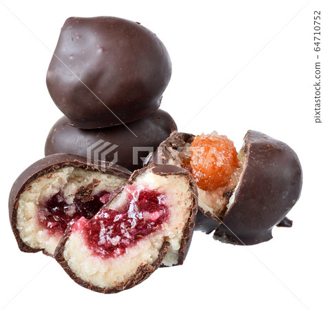 Chocolate marzipan bar with fruit filling isolated Chocolate marzipan bar with fruit filling isolated 64710752