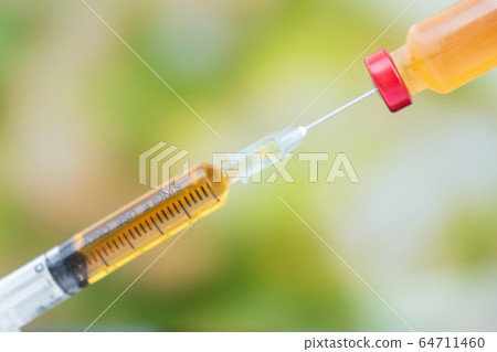 The picture of Yellow vaccine tube and syringe are The picture of Yellow vaccine tube and syringe are 64711460