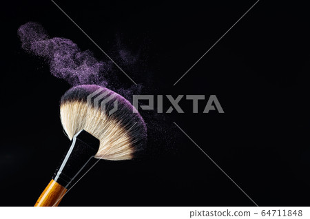 Makeup concept with a  professional makeup brush 64711848