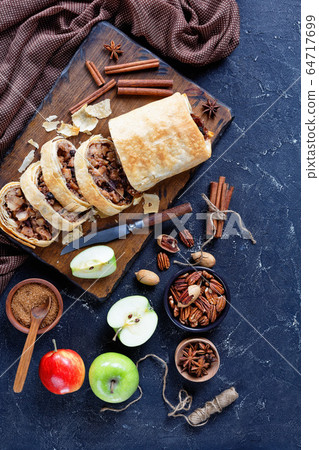 Apple strudel of filo dough with ingredients Apple strudel of filo dough with ingredients 64717699