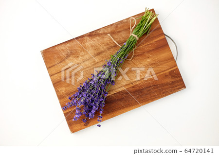 bunch of lavender flowers on wooden board bunch of lavender flowers on wooden board 64720141
