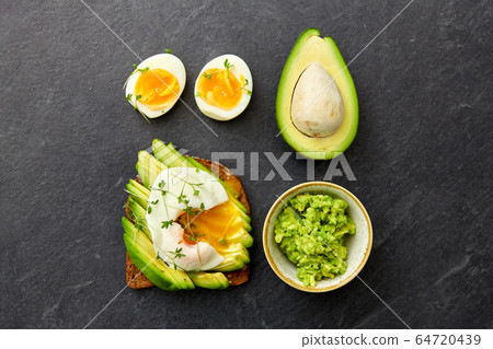 toast bread with avocado, pouched egg and greens toast bread with avocado, pouched egg and greens 64720439