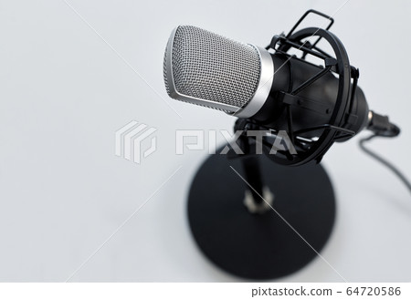 close up of microphone on white background 64720586