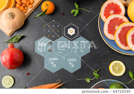 different vegetables and fruits on on slate table different vegetables and fruits on on slate table 64720595