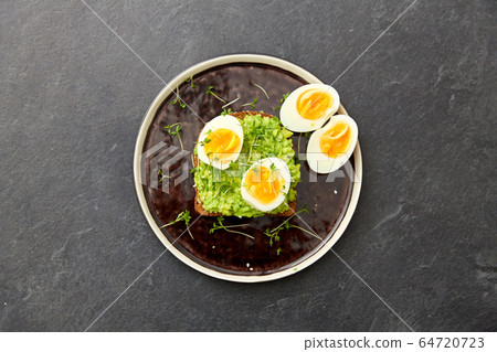 toast bread with mashed avocado and eggs toast bread with mashed avocado and eggs 64720723