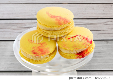 close up of macaroons on confectionery stand 64720802