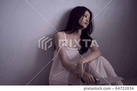 Woman suicide sadness 64722034