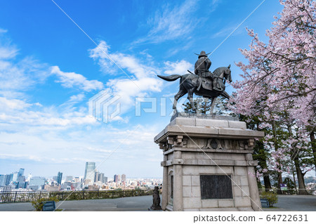 Statue of Masamune Date, equestrian statue overlooking the cherry blossoms and Sendai city 64722631