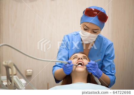 dentistry, patient examination and treatment at the dentist dentistry, patient examination and treatment at the dentist 64722698