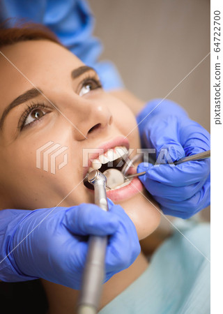 dentistry, patient examination and treatment at the dentist dentistry, patient examination and treatment at the dentist 64722700