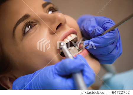 dentistry, patient examination and treatment at the dentist dentistry, patient examination and treatment at the dentist 64722702