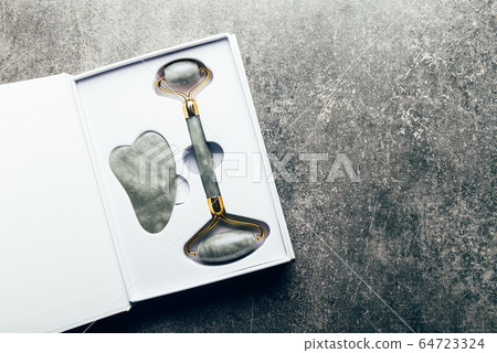 Jade face roller and Gua sha stone 64723324