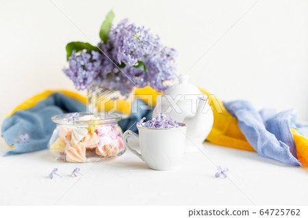 Lilac fresh flowers on the white background. Spring concept Lilac fresh flowers on the white background. Spring concept 64725762