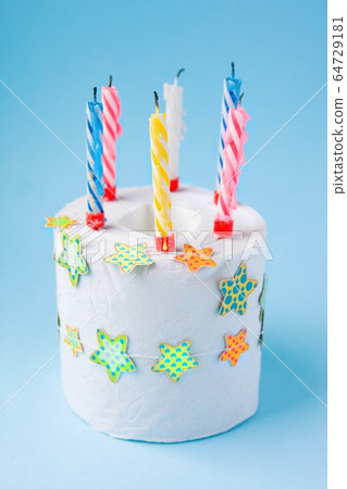Quarantine birthday. Candles in roll of toilet paper as birthday cake Quarantine birthday. Candles in roll of toilet paper as birthday cake 64729181