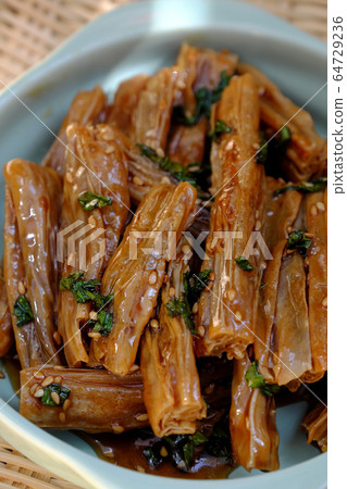 delicious food from vegetable protein, tofu skin cook with sauce, healthy food for vegan 64729236