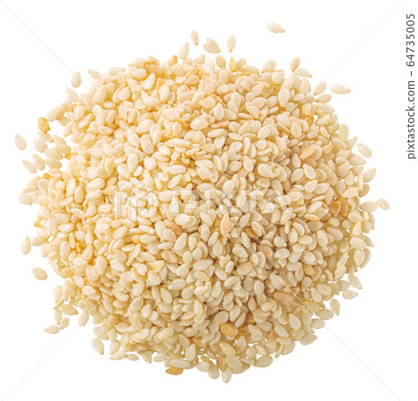 White sesame seeds pile, paths, top White sesame seeds pile, paths, top 64735005