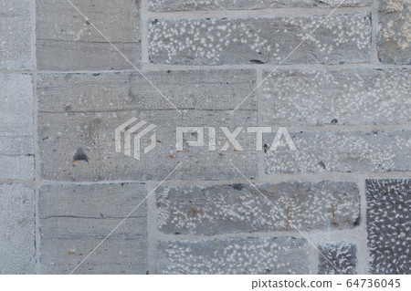 Old weathered granite stone wall textured natural background Old weathered granite stone wall textured natural background 64736045