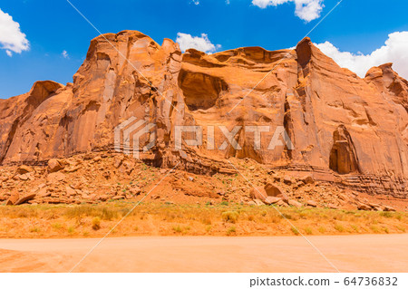Monument Valley on the border between Arizona and 64736832
