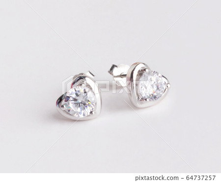 A pair of beautiful 925 sterling silver earrings in heart shape decorated with diamond  64737257