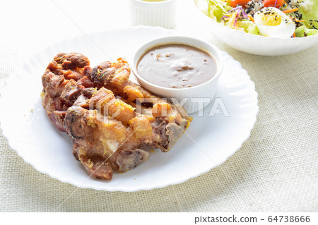 Deep fried pork knuckle with mushroom gravy Deep fried pork knuckle with mushroom gravy 64738666