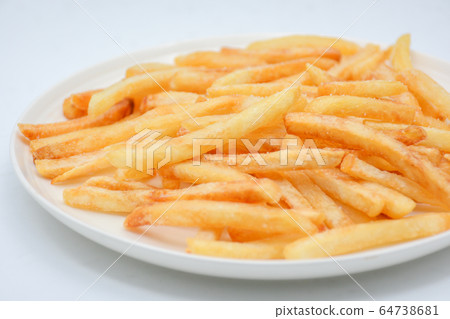 French fries on white dish and white background. 64738681
