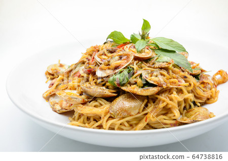 Stir fried noodles with clams and herbs, hot and Stir fried noodles with clams and herbs, hot and 64738816
