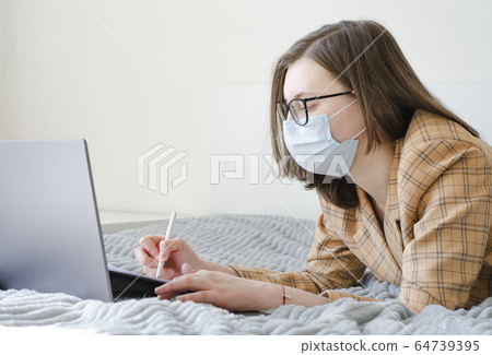 Coronavirus. Quarantine. Business lady solves work Coronavirus. Quarantine. Business lady solves work 64739395