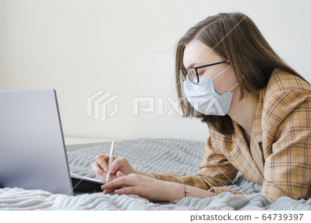 Coronavirus. Quarantine. Business lady solves work Coronavirus. Quarantine. Business lady solves work 64739397