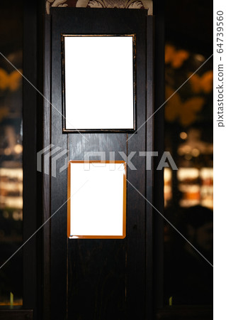 Closeup of a blank whiteboard in pub interior. Mock up, billboard, ad space frame Closeup of a blank whiteboard in pub interior. Mock up, billboard, ad space frame 64739560