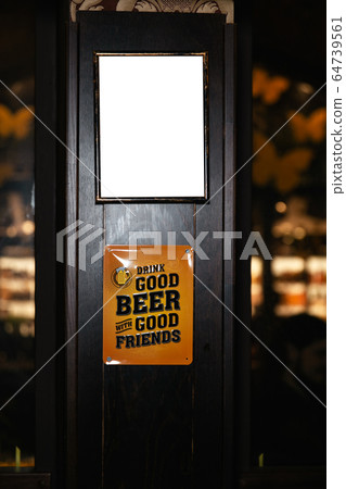 Closeup of a blank whiteboard in pub interior. Mock up, billboard, ad space frame 64739561