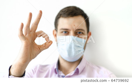 Coronavirus. Quarantine. A man in a shirt in a 64739692