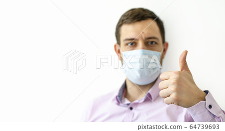 Coronavirus. Quarantine. A man in a shirt in a Coronavirus. Quarantine. A man in a shirt in a 64739693