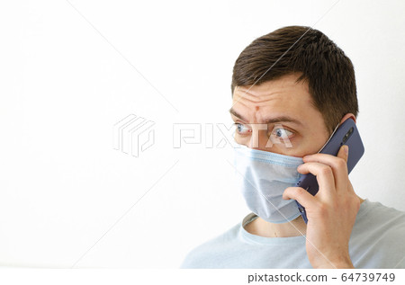 Coronavirus. Quarantine. A man solves work issues 64739749