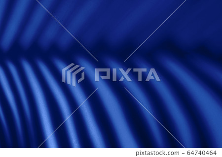 Beautiful monstera leaves shadow colored background in artificial light Beautiful monstera leaves shadow colored background in artificial light 64740464