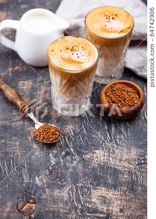 Dalgona whipped coffee with milk 64742906