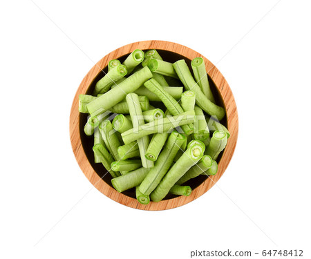 yardlong beans in wooden bowl on white background 64748412