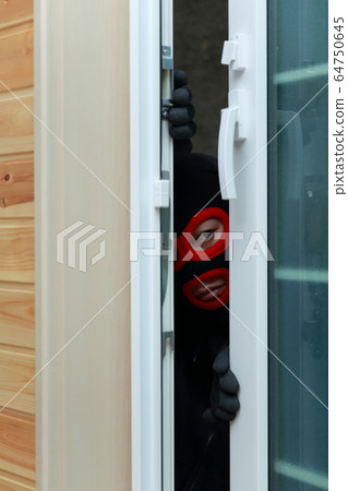 One man (Residential invasion thief crime criminal illegal culprit villain stolen cigarette hat disguised suspect case criminal) 64750645