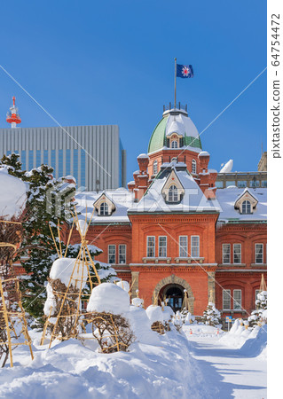 Former Hokkaido Government Office Building on a snowy day 64754472