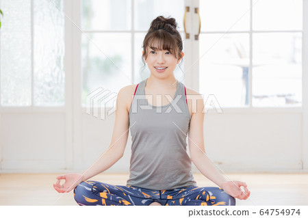 Female yoga fitness home 64754974