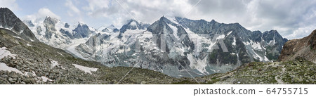 Panorama of a mountain ridge with Ober Gabelhorn and Dent Blanche peaks of Swiss Alps Panorama of a mountain ridge with Ober Gabelhorn and Dent Blanche peaks of Swiss Alps 64755715