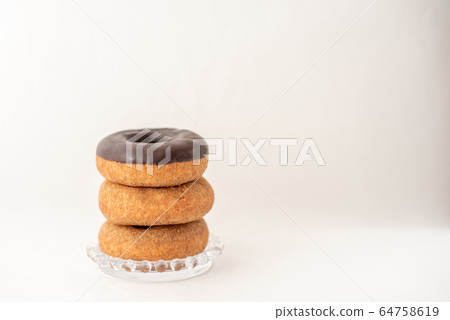 Today's snack is a cute donut 64758619