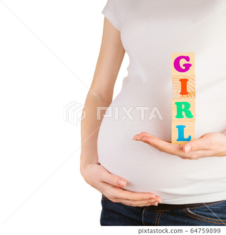 Pregnant woman belly with hands holding wooden blocks with girl sign isolated on white Pregnant woman belly with hands holding wooden blocks with girl sign isolated on white 64759899