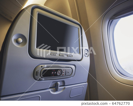 Airplane seats Blank screen monitor window seat Economy class Airplane seats Blank screen monitor window seat Economy class 64762770