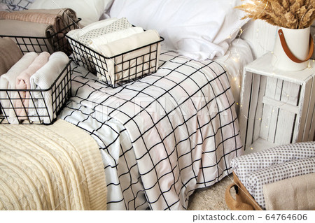 Top view of beautifully folded things in container Top view of beautifully folded things in container 64764606