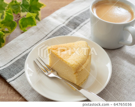 Souffle cheesecake and coffee 64765036