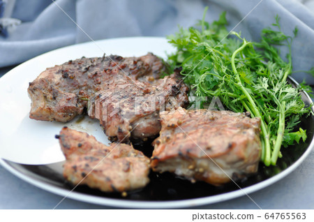 grilled pork , pork steak and beef steak 64765563